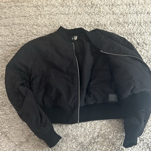 H&M Black bomber jacket. Zip up, pockets plus little zipper pocket on sleeve - Picture 2 of 3